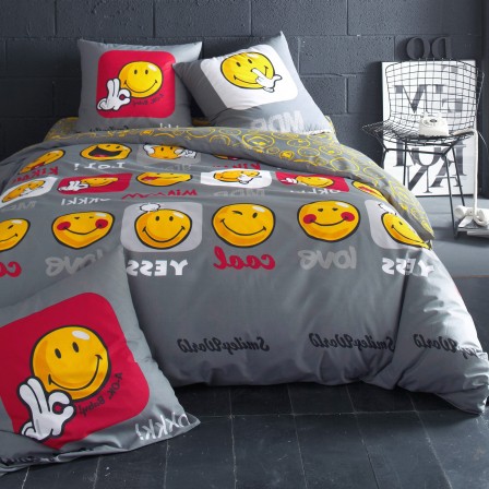 housse_smiley_pour_lit_enfant_ado_et_adulte_housse_grise_avec_nombreux_smileys_et_texte_correspondant_a_l_expression_housse_smiley_originale_pour_ado.jpg