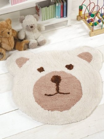 tapis_ours_chambre_bebe_et_enfant_tapis_forme_tete_d_ours_pour_decorer_et_proteger_sol_chambre_enfant_coloris_beige_et_marron.jpg