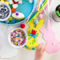 Step by step. Mother and daughter decorating Easter Bunnies.